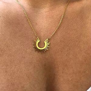Gold plated starburst necklace
